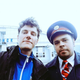 The author of this story, Roger Tyers, meeting a train guard in Siberia